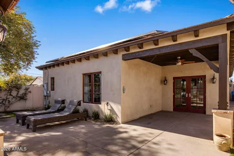a view of a car park in front of house
