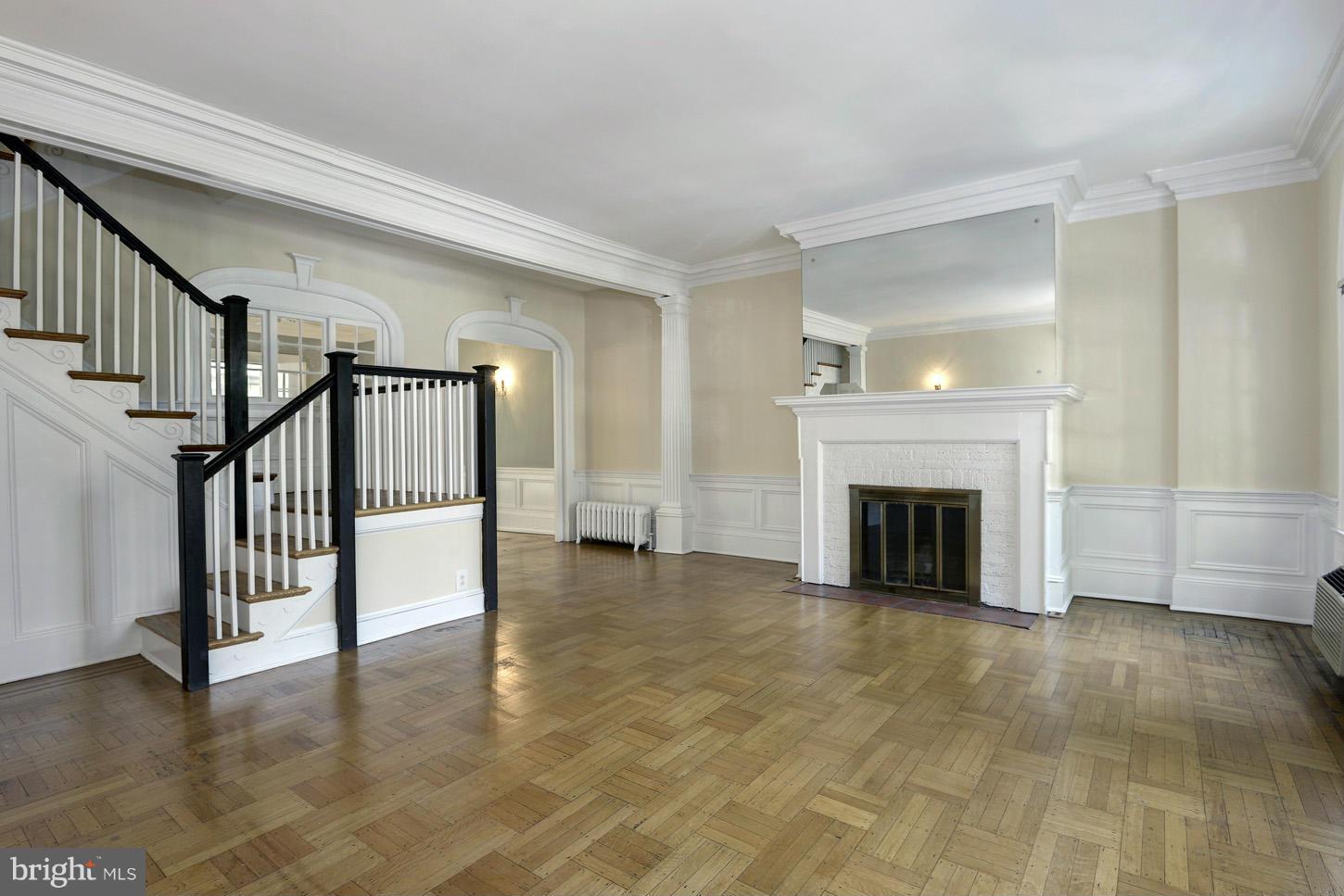 1922 Belmont Road Northwest Washington, DC 20009 - Photo 4 of 20 Living Room with Wood Burning Fireplace