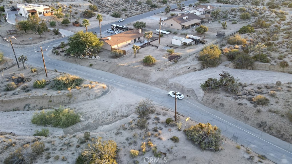 0 Buena Suerte Road Yucca Valley, CA 92284 - Photo 3 of 15 a view of a dry yard with trees