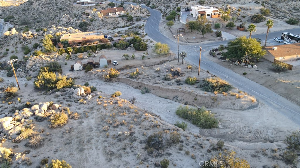 0 Buena Suerte Road Yucca Valley, CA 92284 - Photo 5 of 15 a view of a yard with some trees