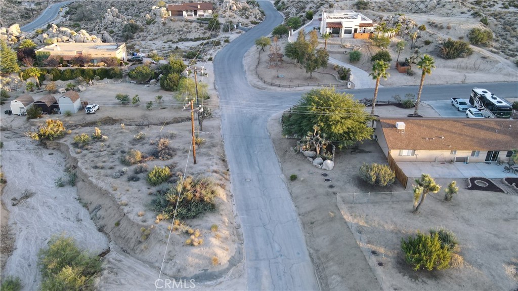 0 Buena Suerte Road Yucca Valley, CA 92284 - Photo 6 of 15 an aerial view of a house with a yard and lake view