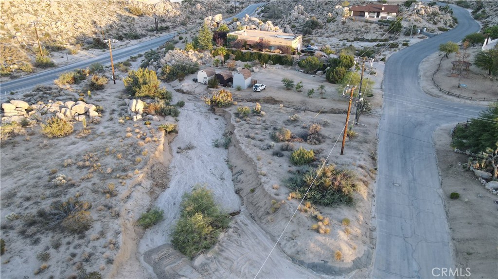 0 Buena Suerte Road Yucca Valley, CA 92284 - Photo 7 of 15 a view of a plants with wooden fence