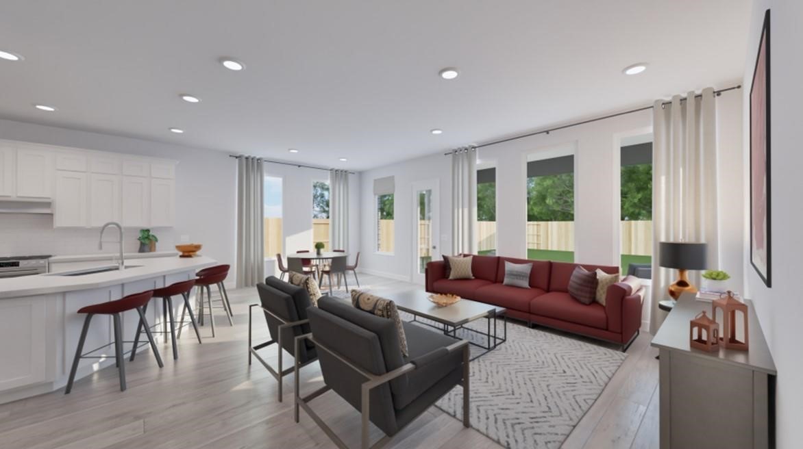 8306 Holly Blue Drive Rosharon, TX 77583 - Photo 7 of 25 a living room with furniture and wooden floor