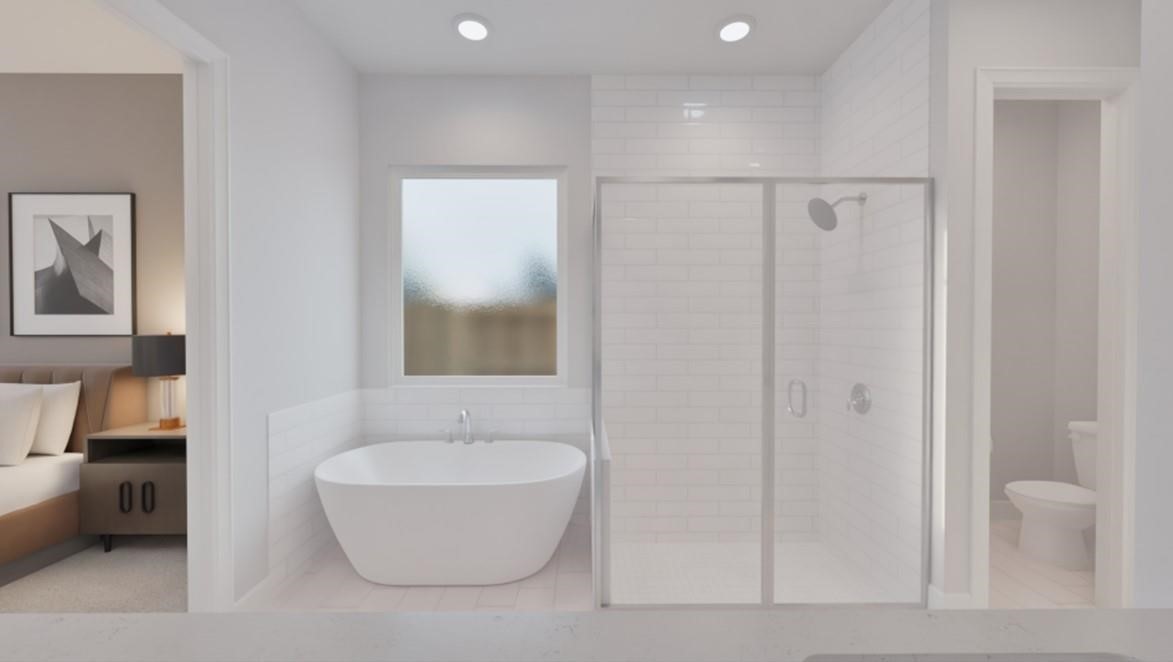 8306 Holly Blue Drive Rosharon, TX 77583 - Photo 9 of 25 a bathroom with a bathtub and shower