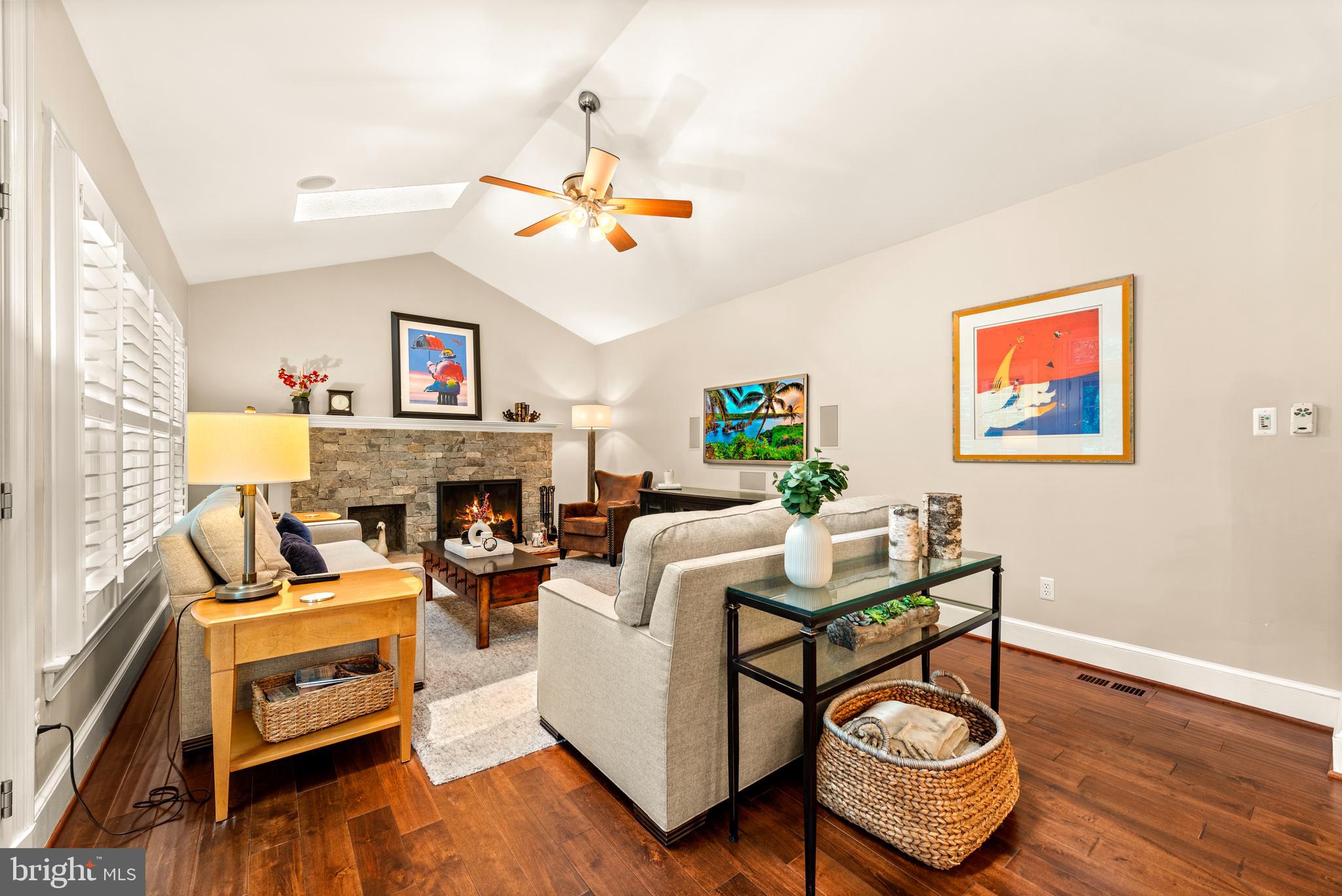 11909 Winstead Lane Reston, VA 20194 - Photo 24 of 60 Family room with ceiling fan and cozy fireplace
