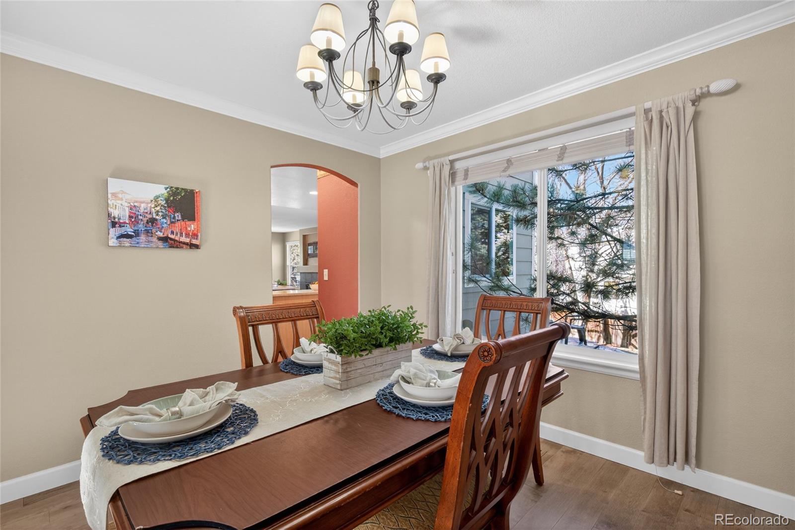 747 West Sparrow Hawk Drive Highlands Ranch, CO 80129 - Photo 24 of 50 a view of a dining room with furniture window and outside view
