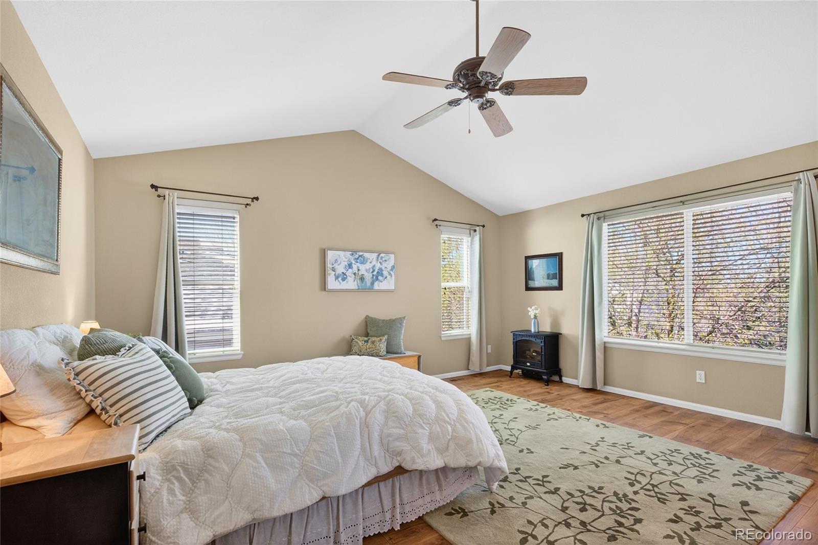 747 West Sparrow Hawk Drive Highlands Ranch, CO 80129 - Photo 28 of 50 a bedroom with a large bed and a window