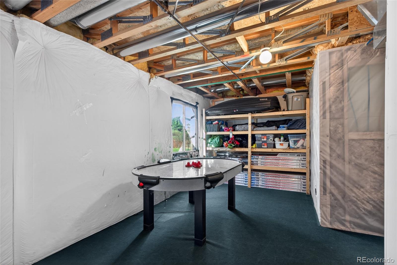 747 West Sparrow Hawk Drive Highlands Ranch, CO 80129 - Photo 40 of 50 a reading room with furniture and a table