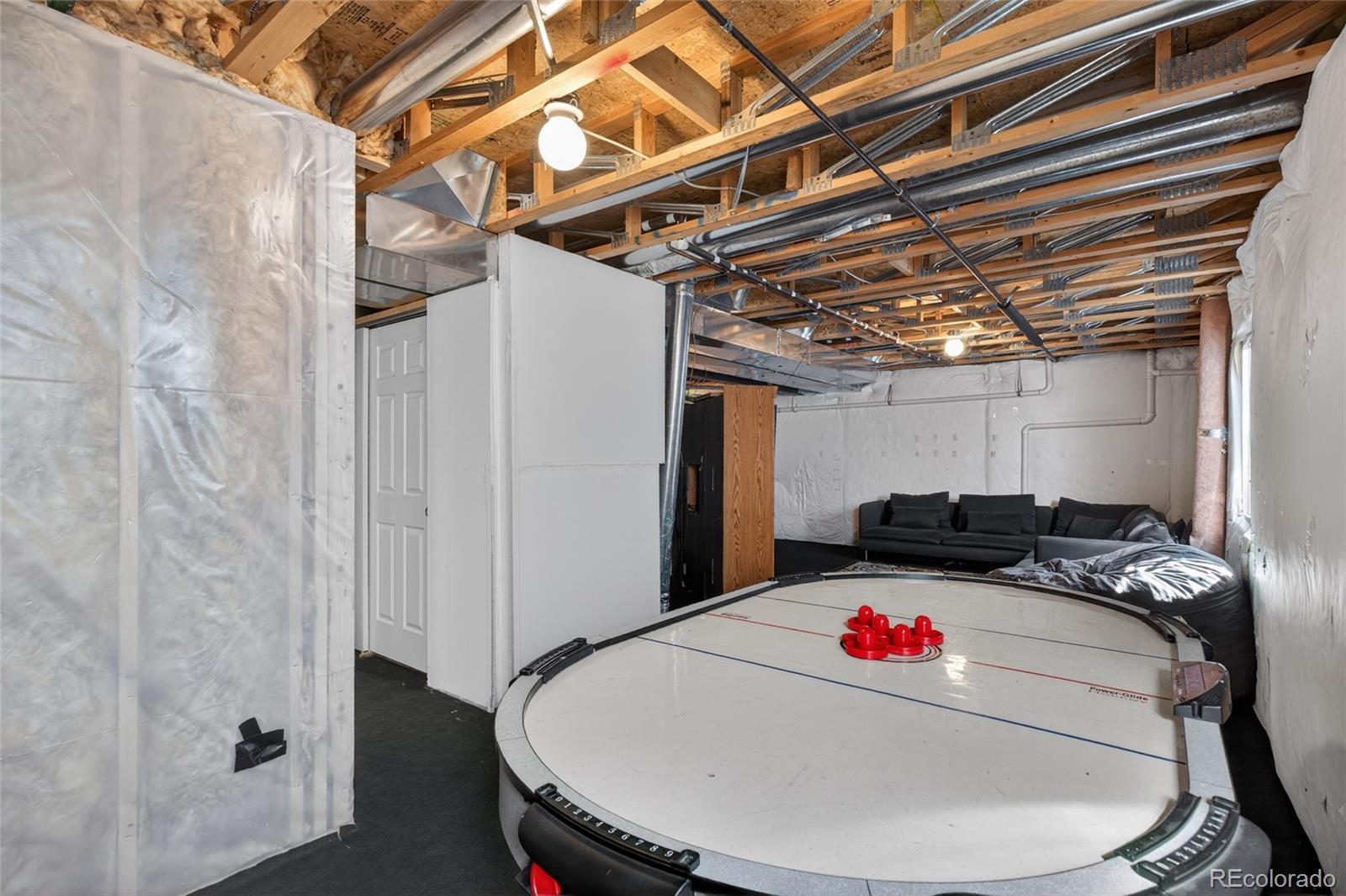 747 West Sparrow Hawk Drive Highlands Ranch, CO 80129 - Photo 41 of 50 a room with storage and utility