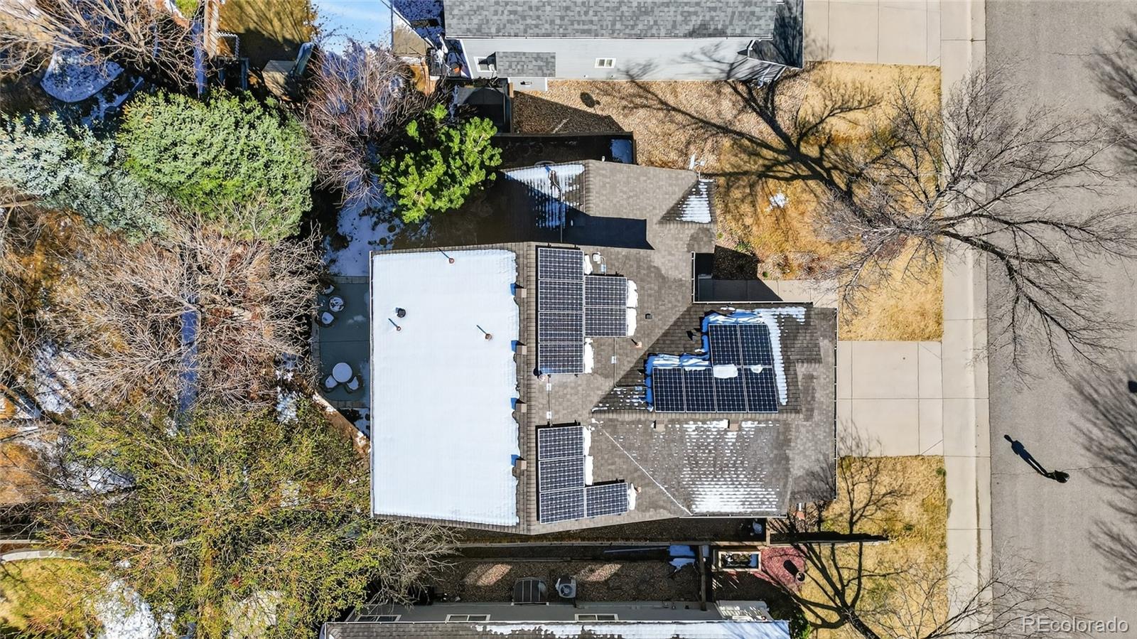 747 West Sparrow Hawk Drive Highlands Ranch, CO 80129 - Photo 42 of 50 a view of a house with a yard and sitting area