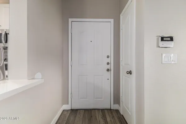a view of a bathroom from a hallway