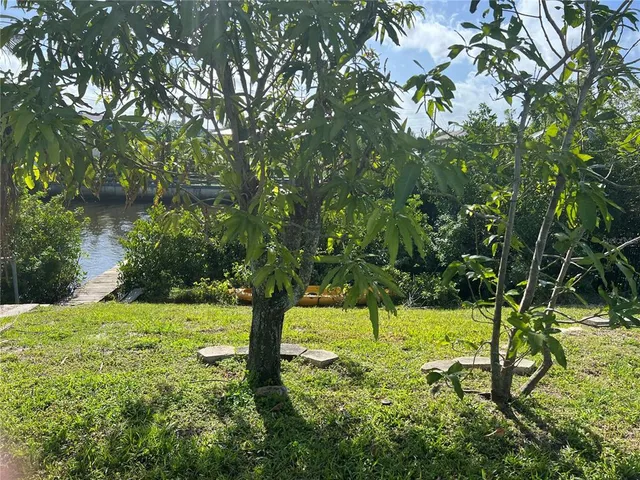 a view of a garden with a patio