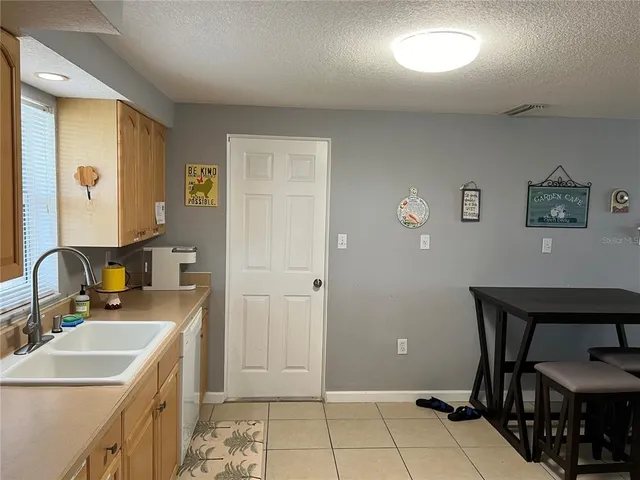 a bathroom with a sink vanity and a mirror