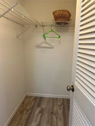 a view of a room with racks on the wall