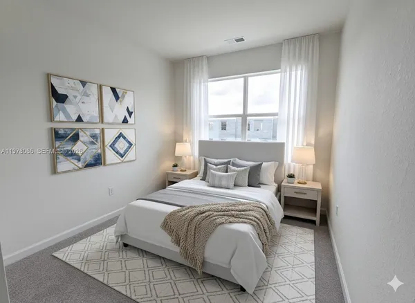 a bedroom with a bed and a window