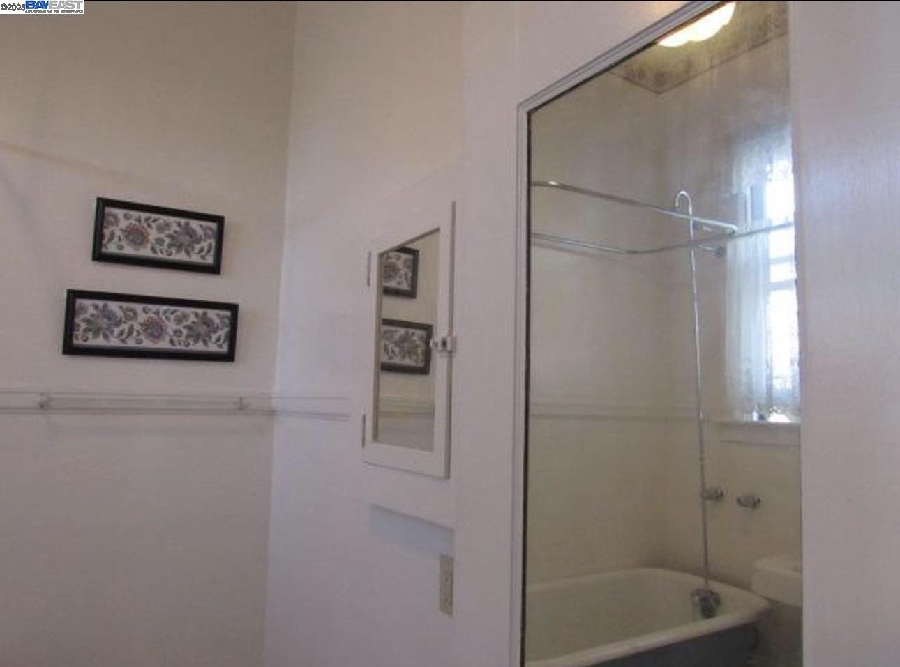 1606 Morton Street Alameda, CA 94501 - Photo 39 of 48 a bathroom with a shower and a sink