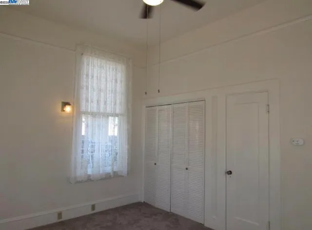 a view of entryway with wooden stairs