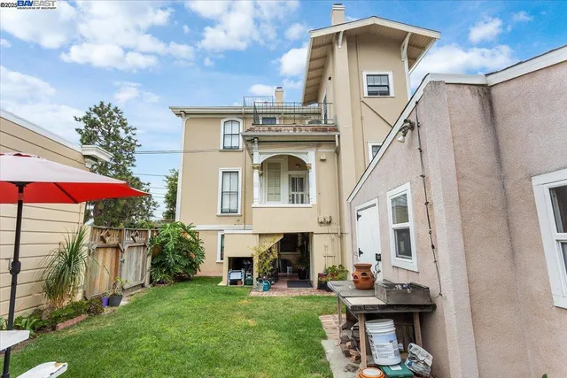 a front view of a house with patio outdoor seating
