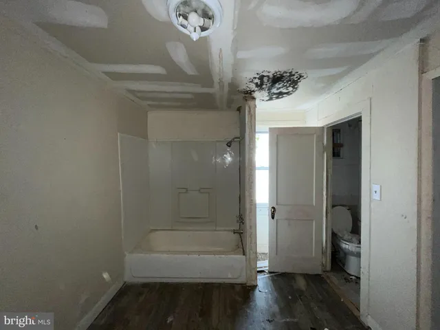 a view of a room with rack on the wall