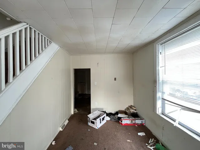 a kitchen with a stove and a cabinet