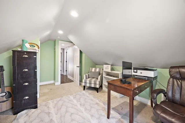 a bedroom with furniture and a area