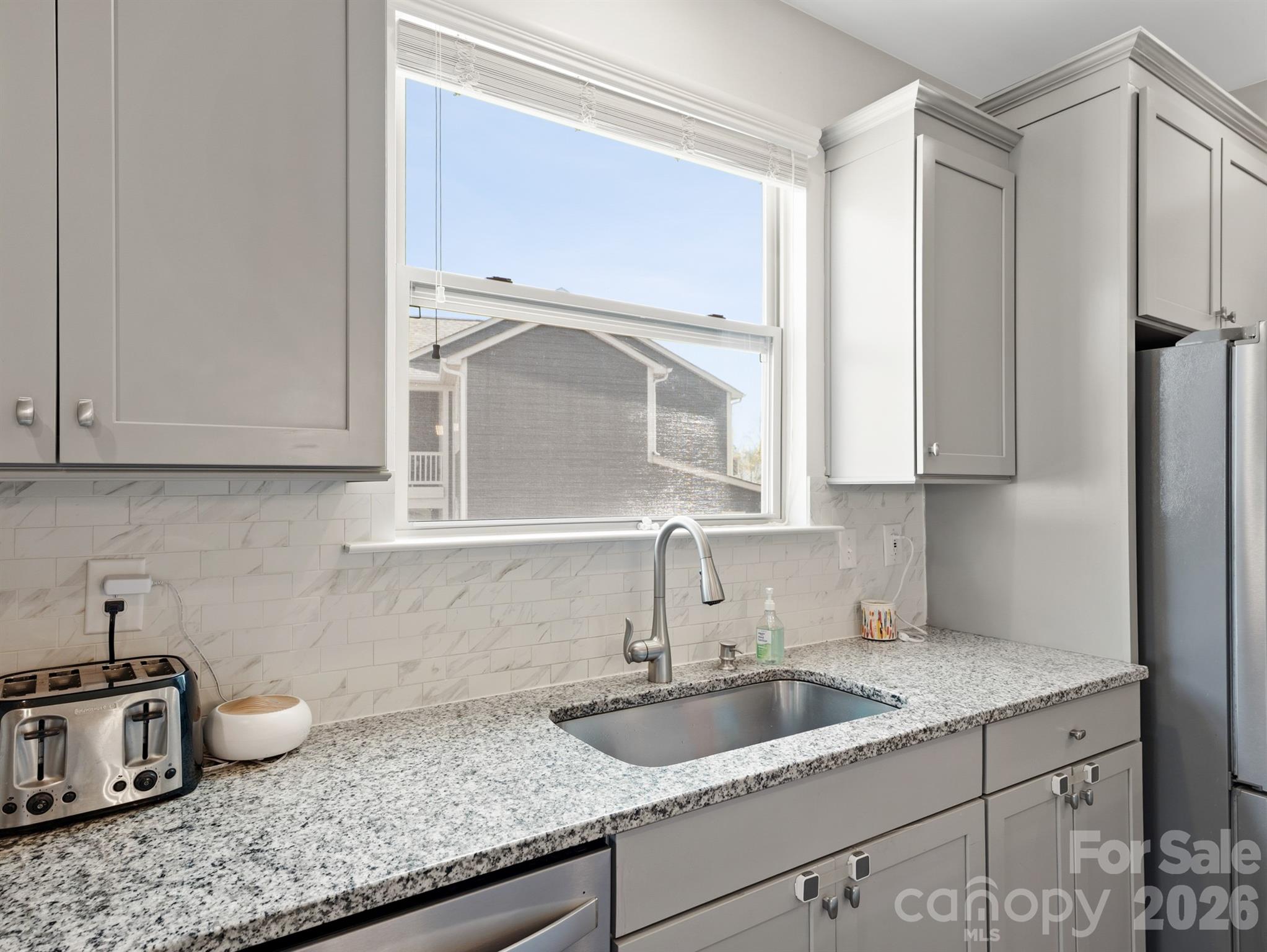 560 Sandbar Point Clover, SC 29710 - Photo 15 of 48 a kitchen with a sink and cabinets