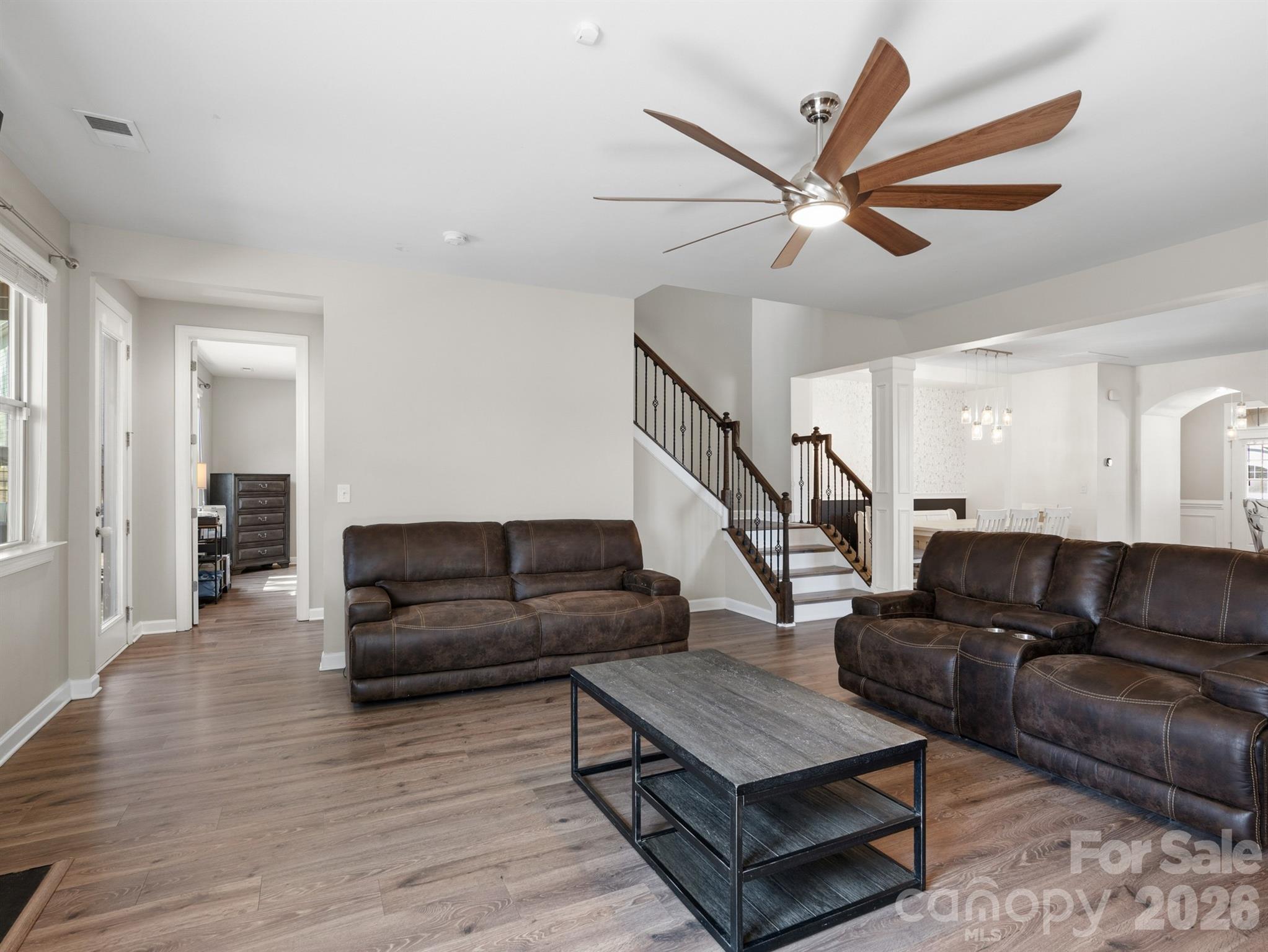 560 Sandbar Point Clover, SC 29710 - Photo 20 of 48 a living room with furniture and a wooden floor