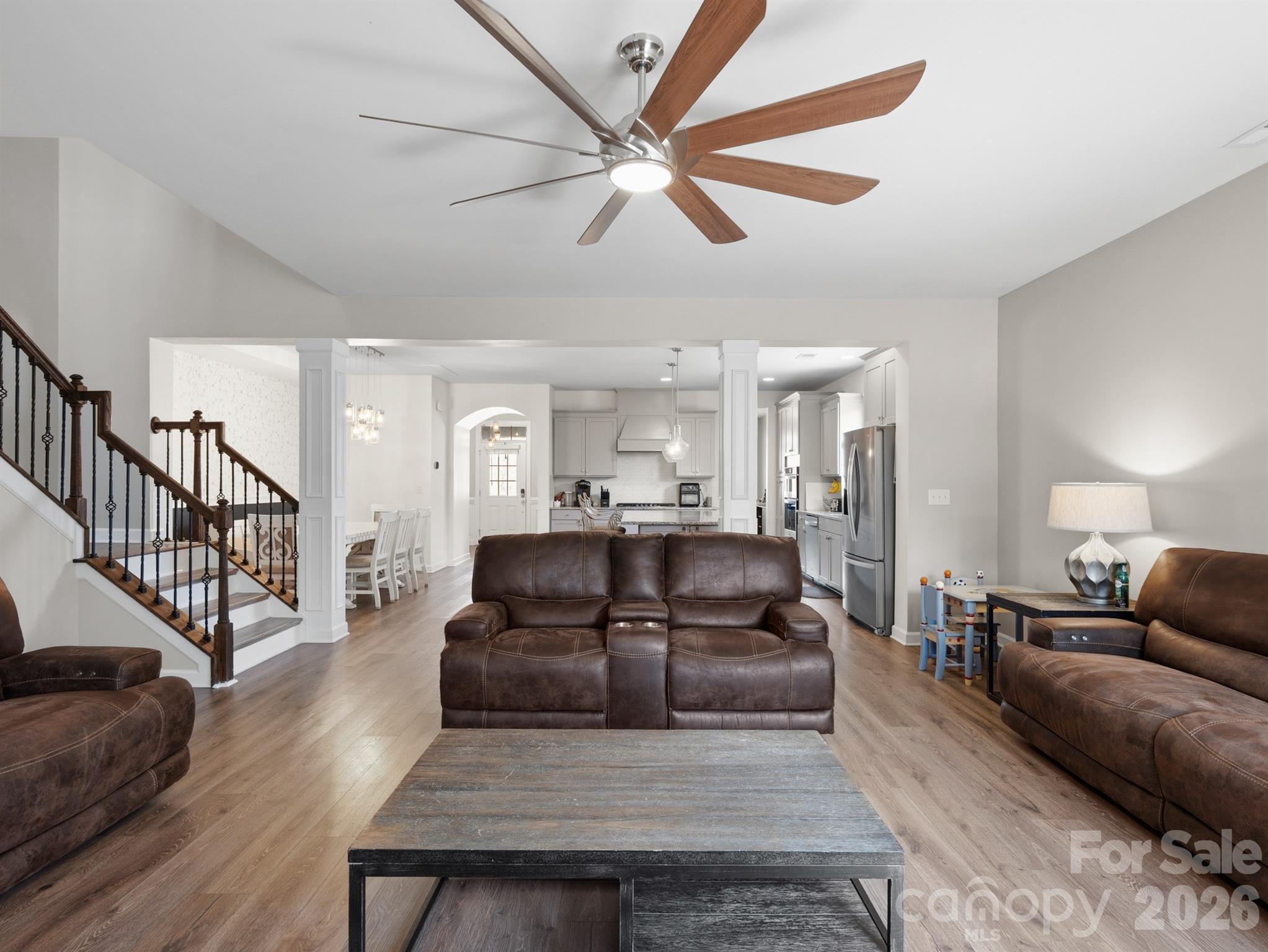 560 Sandbar Point Clover, SC 29710 - Photo 21 of 48 a living room with furniture and a wooden floor