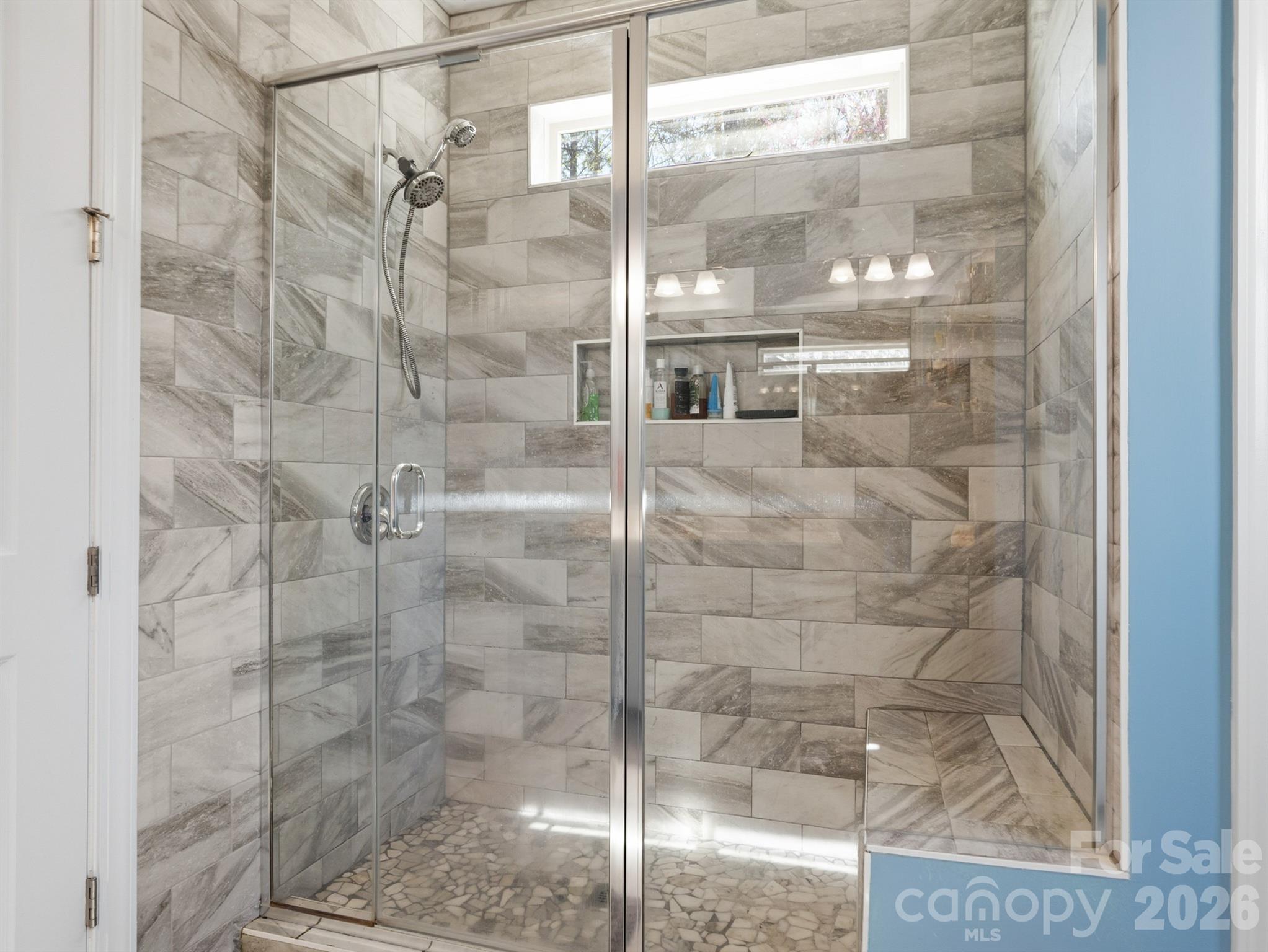 560 Sandbar Point Clover, SC 29710 - Photo 25 of 48 a bathroom with a glass shower door