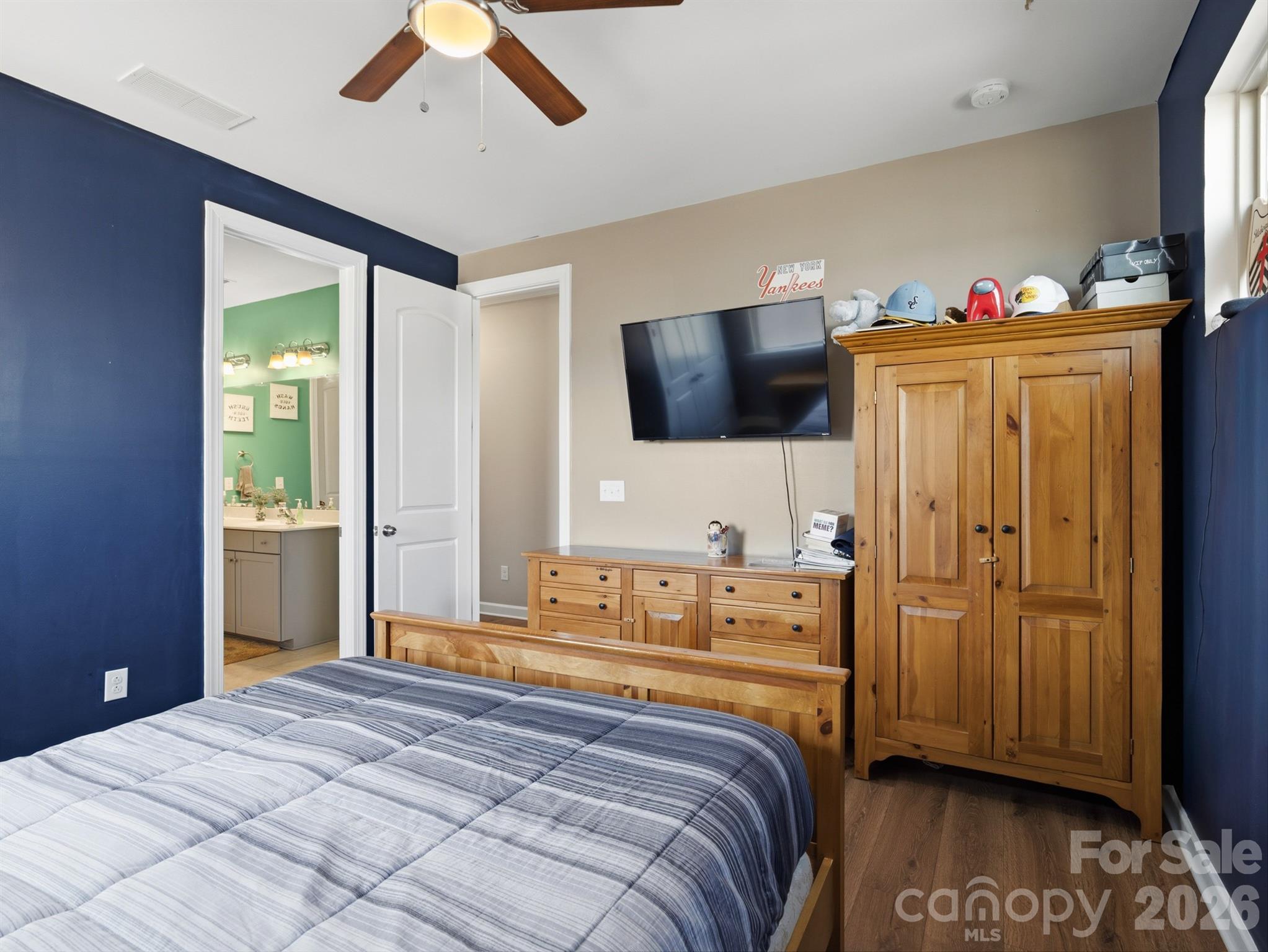 560 Sandbar Point Clover, SC 29710 - Photo 32 of 48 a bedroom with a bed and a flat screen tv
