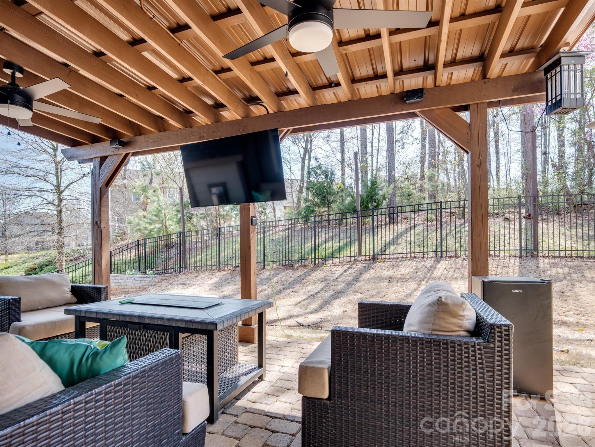 560 Sandbar Point Clover, SC 29710 - Photo 37 of 48 a living room with furniture and a floor to ceiling window
