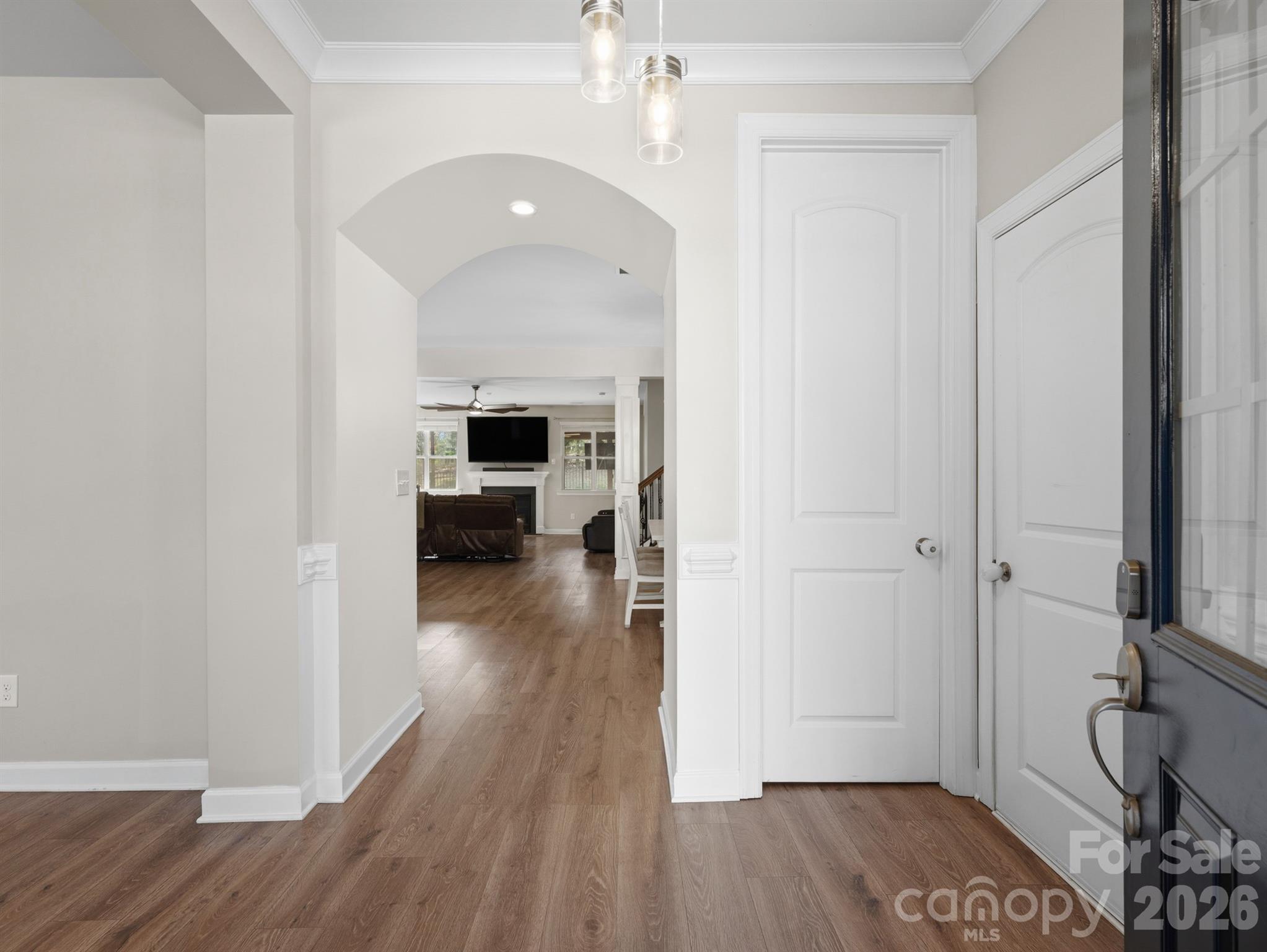 560 Sandbar Point Clover, SC 29710 - Photo 6 of 48 a view of a hallway view with wooden floor and furniture