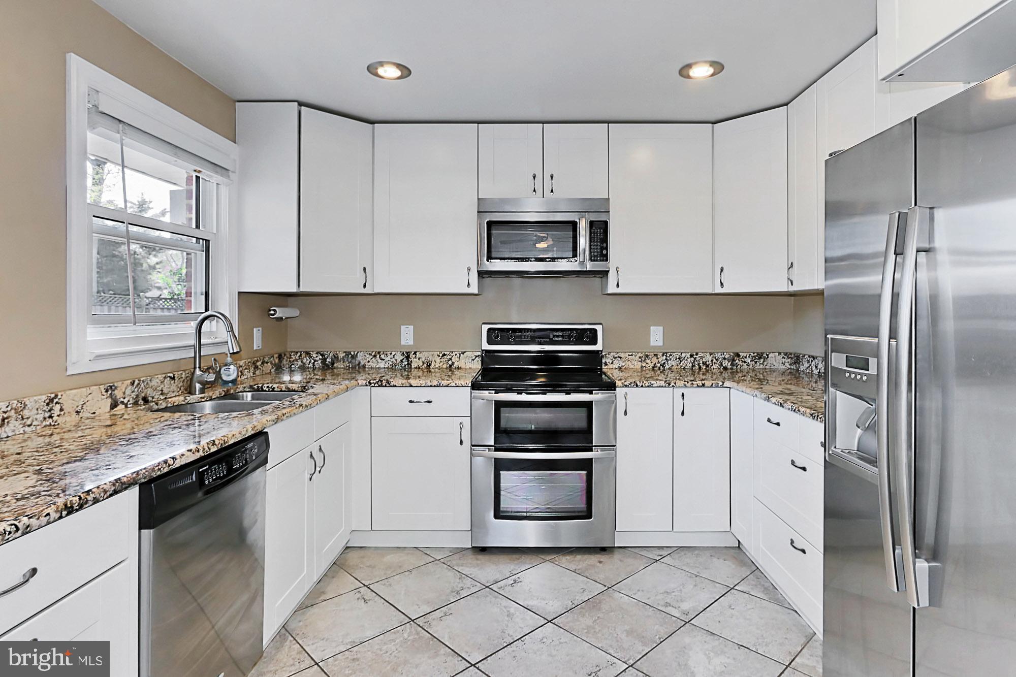 6731 Front Royal Road Springfield, VA 22151 - Photo 11 of 47 Custom cabinets and stainless steel appliances
