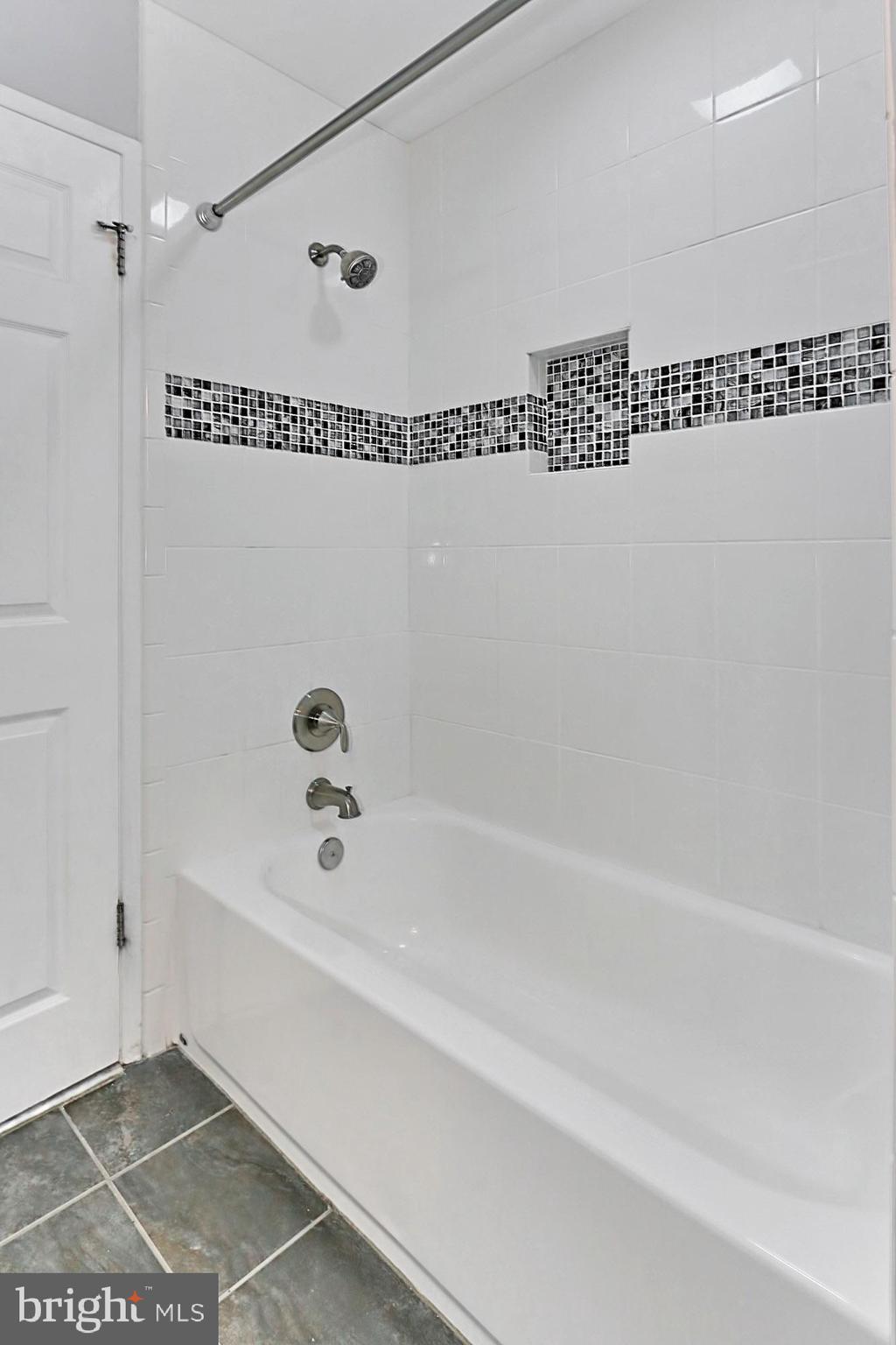 6731 Front Royal Road Springfield, VA 22151 - Photo 23 of 47 Main level bath with shower-tub combo