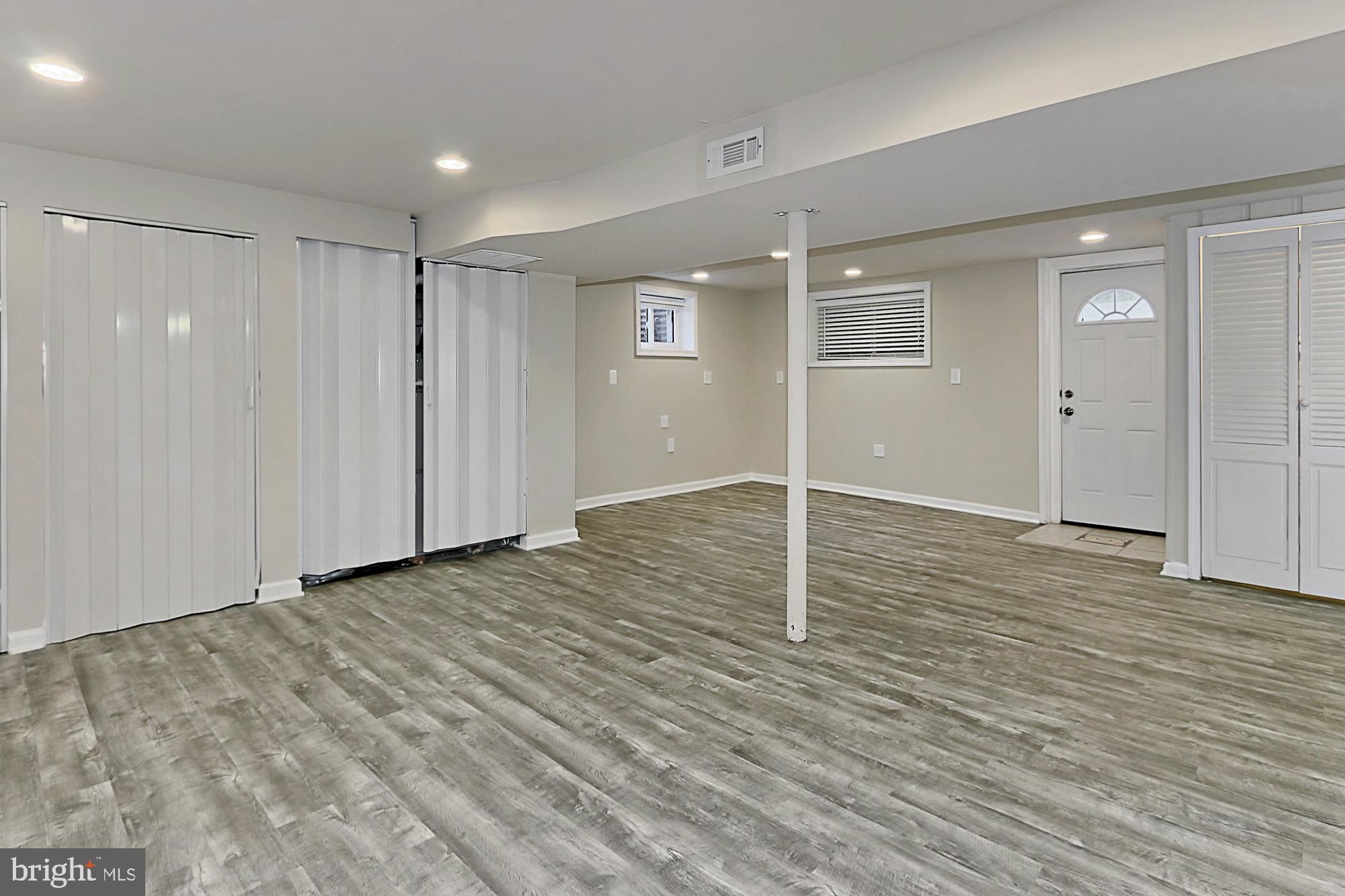 6731 Front Royal Road Springfield, VA 22151 - Photo 32 of 47 Lower level family with storage and laundry