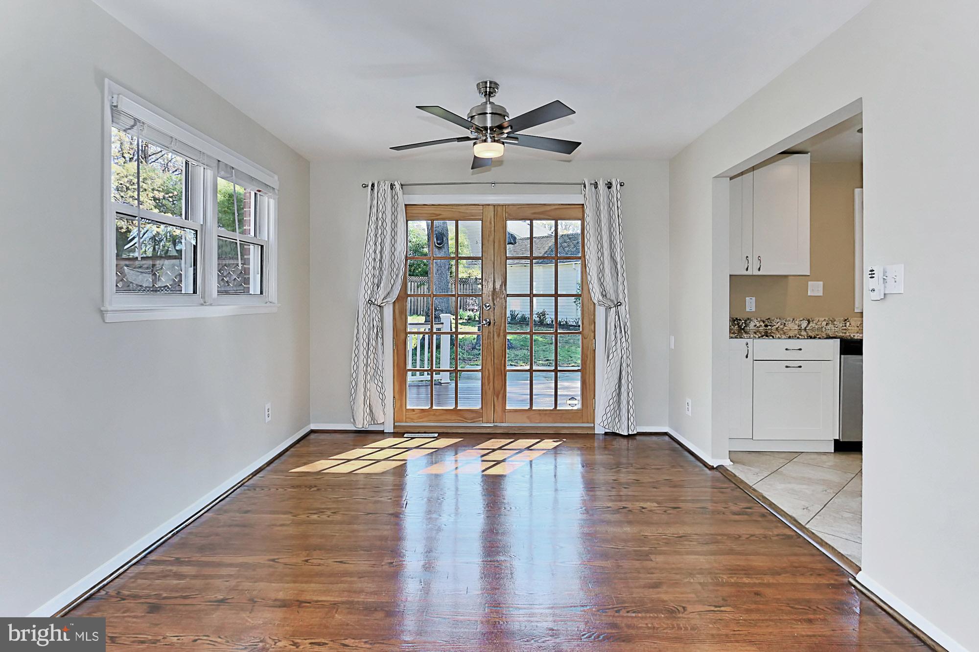 6731 Front Royal Road Springfield, VA 22151 - Photo 9 of 47 French doors in dining area to beautiful deck
