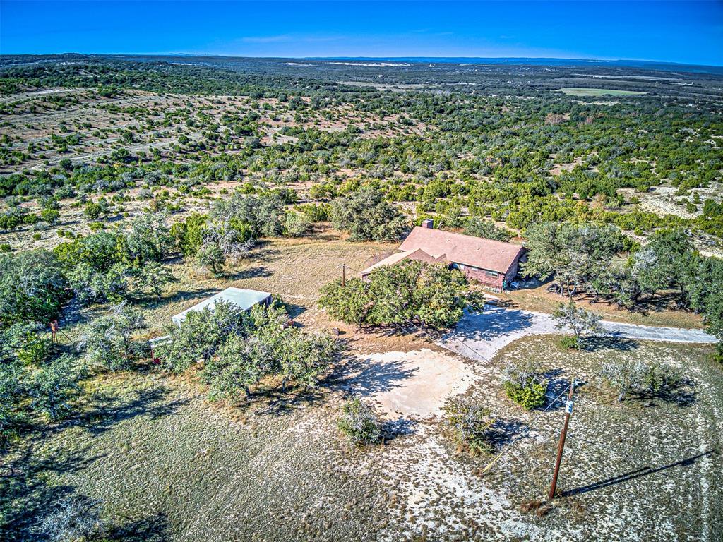 414 Hall Lane Spicewood, TX 78669 - Photo 15 of 16 a view of a yard