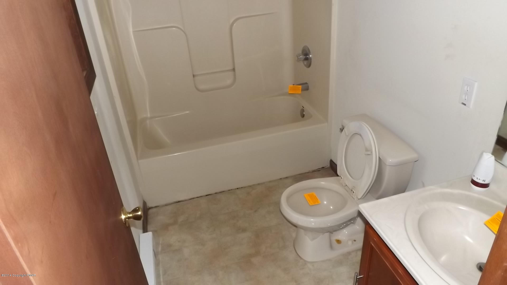 528 Apache Road East Stroudsburg, PA 18302 - Photo 4 of 13 a bathroom with a sink a toilet and bathtub