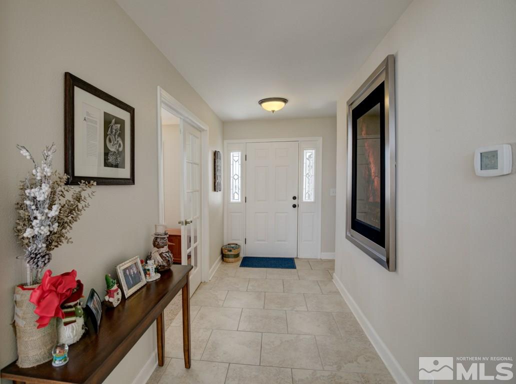 4100 Magnolia Road Fallon, NV 89406 - Photo 9 of 25 a view of a hallway with workspace