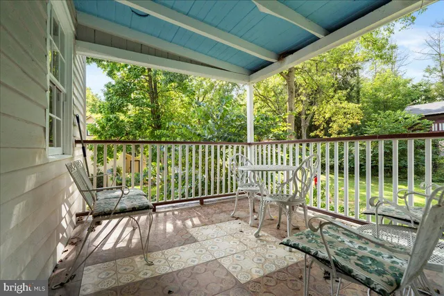 a view of a two chair in the balcony
