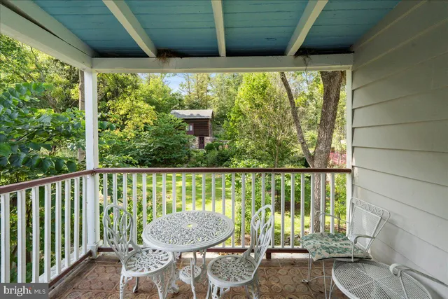 a view of a two chair in the balcony