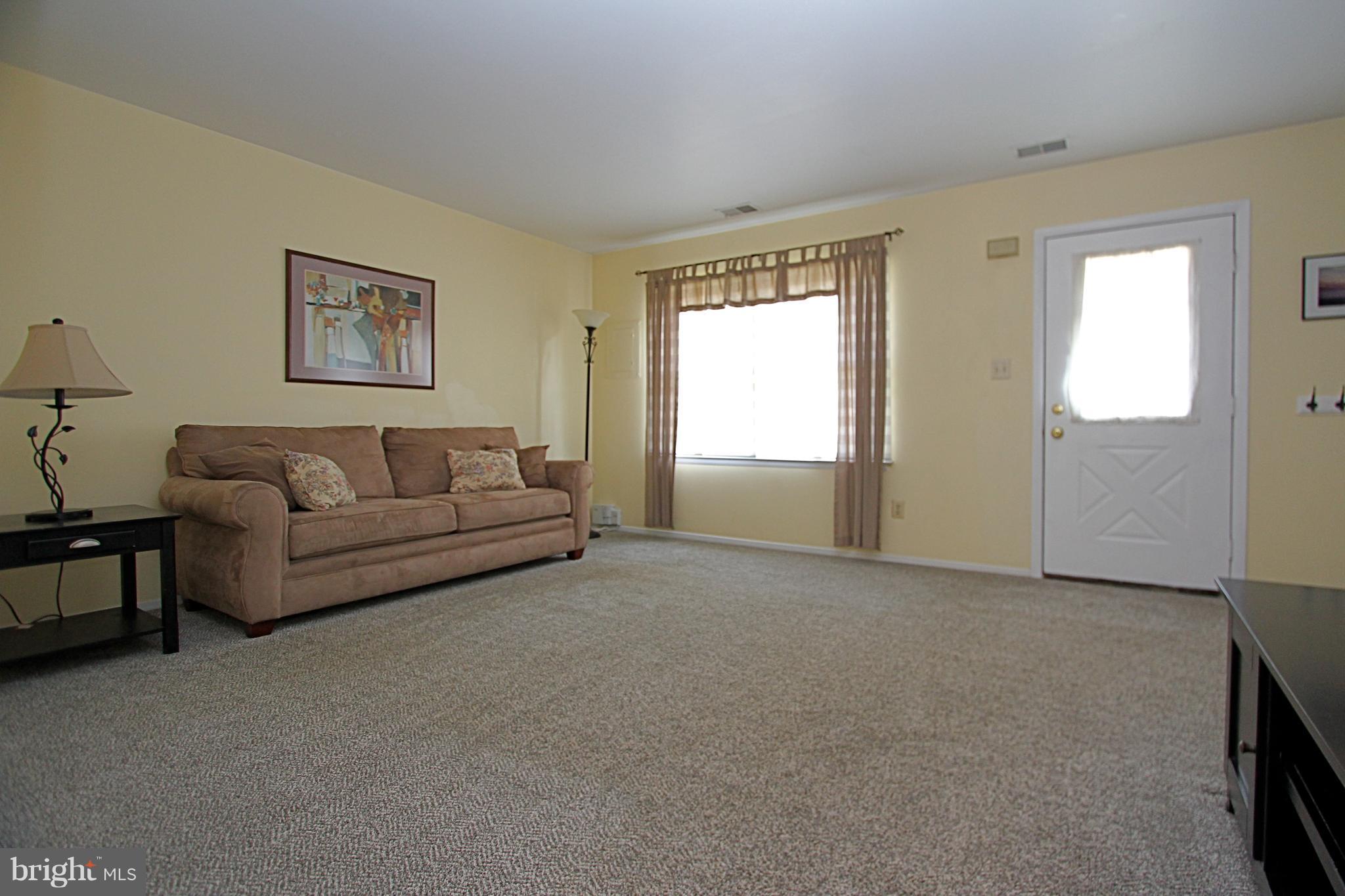 2615 Pearwood Road Baltimore, MD 21234 - Photo 3 of 26 Living room with wall to wall carpet!
