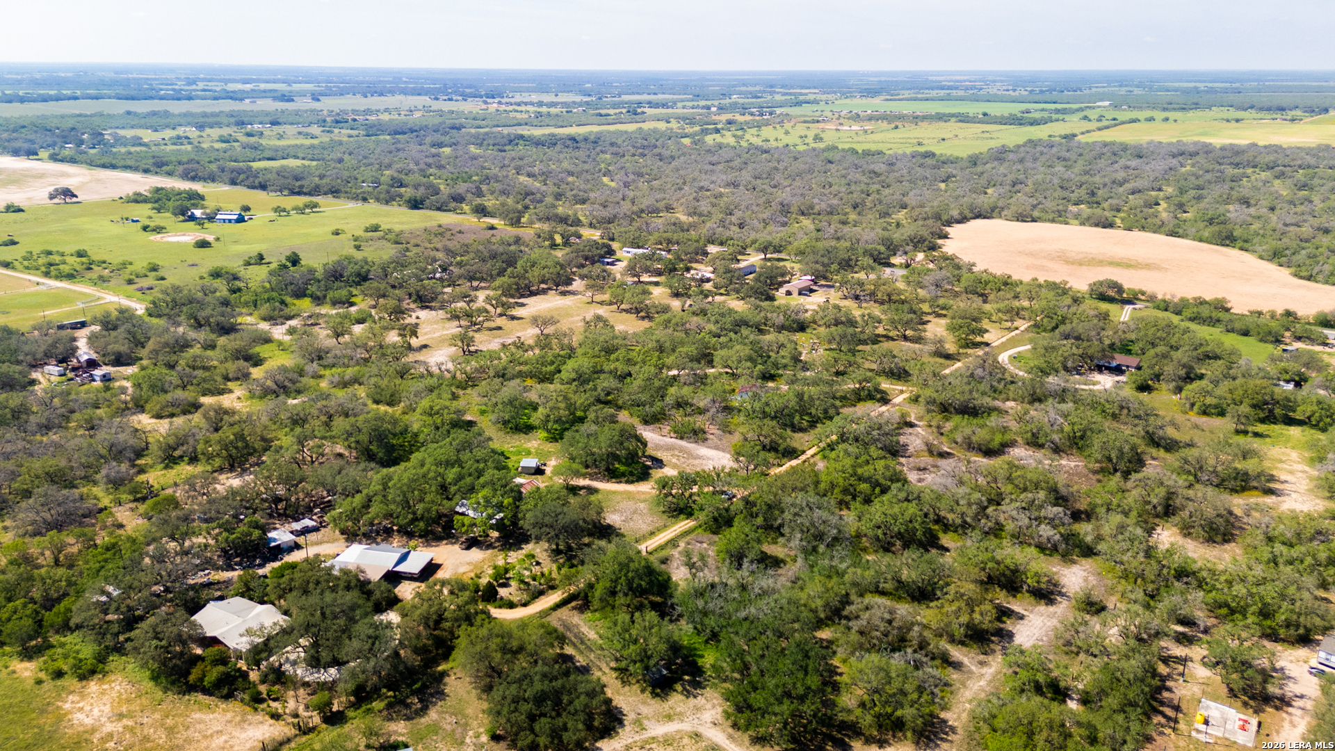 230 P R D65 Poteet, TX 78065 - Photo 25 of 29 a view of a city with an ocean