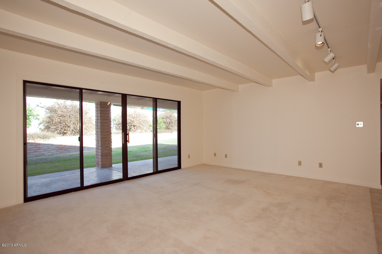 4034 East Rancho Drive Phoenix, AZ 85018 - Photo 15 of 38 a view of an empty room with sliding glass door