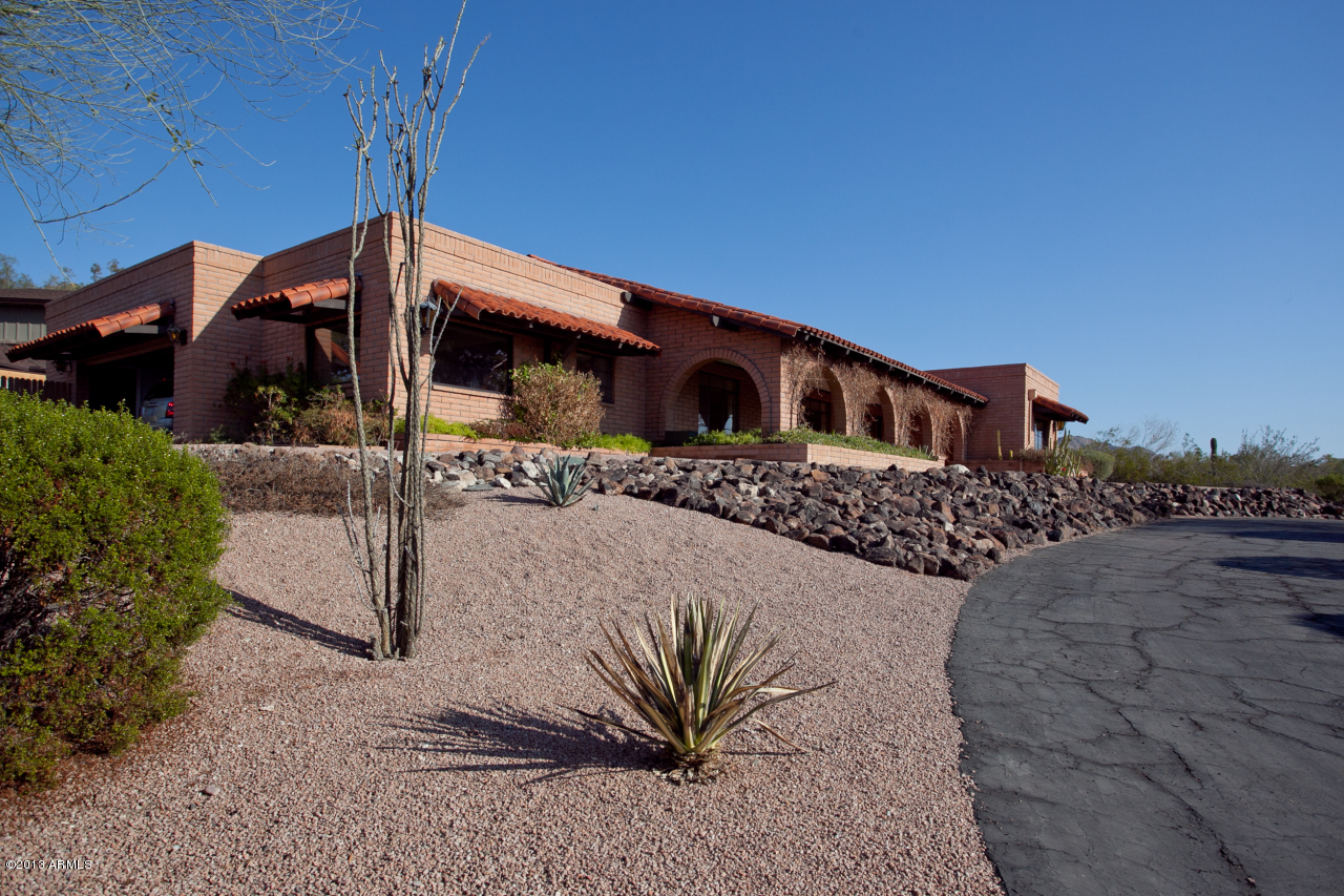 4034 East Rancho Drive Phoenix, AZ 85018 - Photo 38 of 38 a front view of a house with a yard