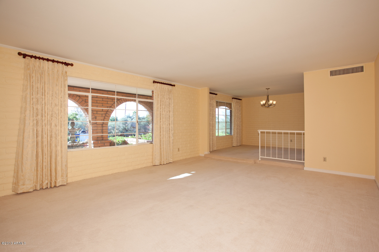 4034 East Rancho Drive Phoenix, AZ 85018 - Photo 10 of 38 a view of an empty room with a window