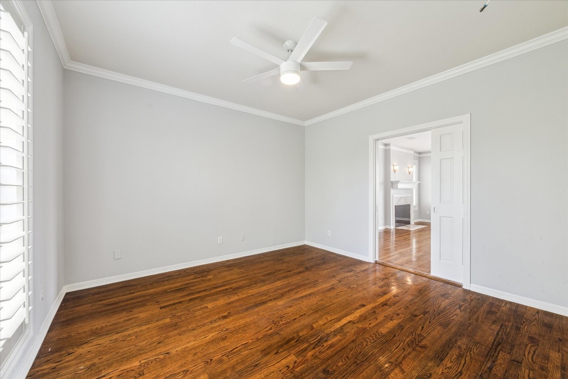 1406 Spring Cress Lane Seabrook, TX 77586 - Photo 19 of 50 wooden floor in an empty room with a window