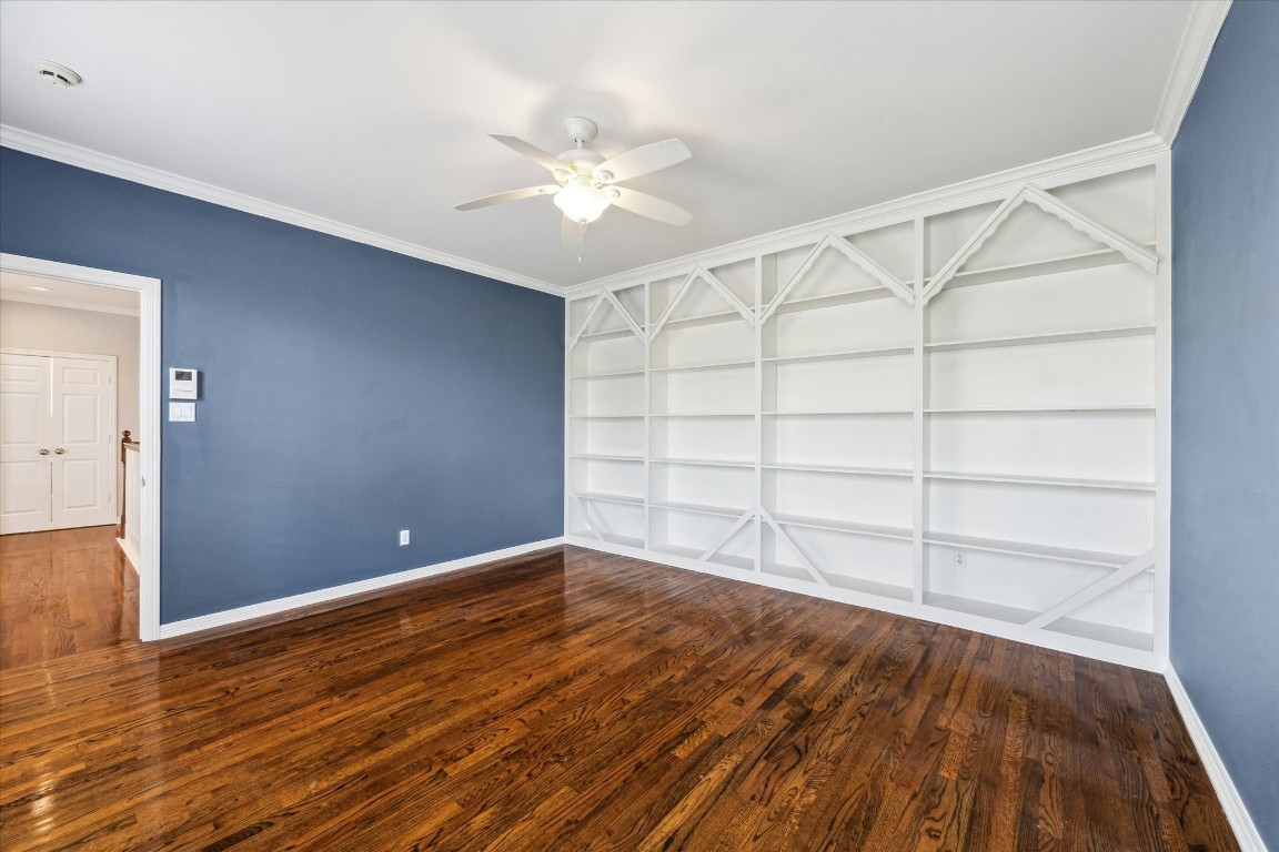 1406 Spring Cress Lane Seabrook, TX 77586 - Photo 24 of 50 a view of an empty room with wooden floor and a window