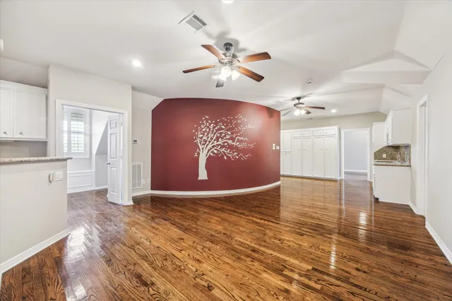 a view of living room with furniture and flat screen tv