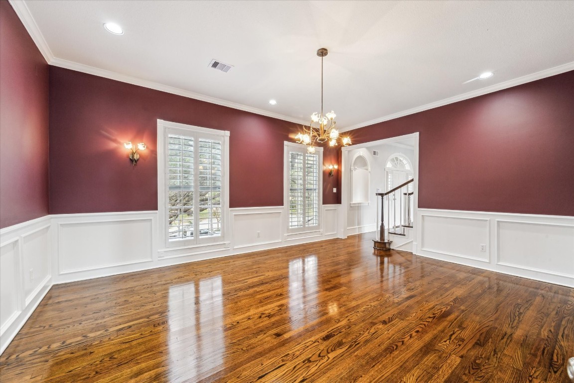 1406 Spring Cress Lane Seabrook, TX 77586 - Photo 9 of 50 a view of an empty room with window and wooden floor
